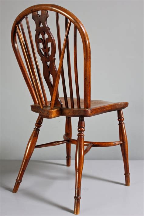 pictures of antique wooden chairs.